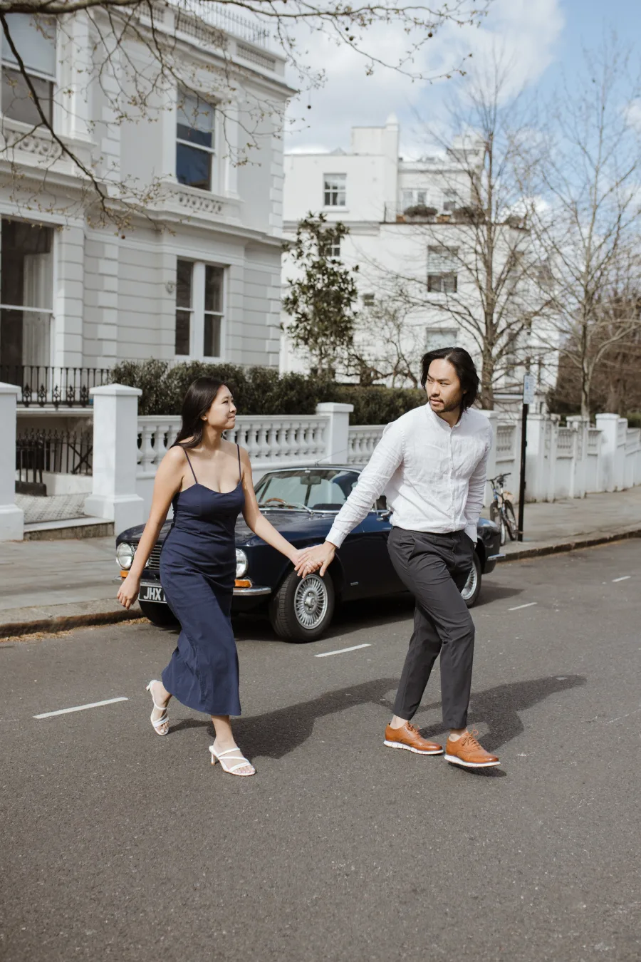 Lisa and Steven walking hand in hand